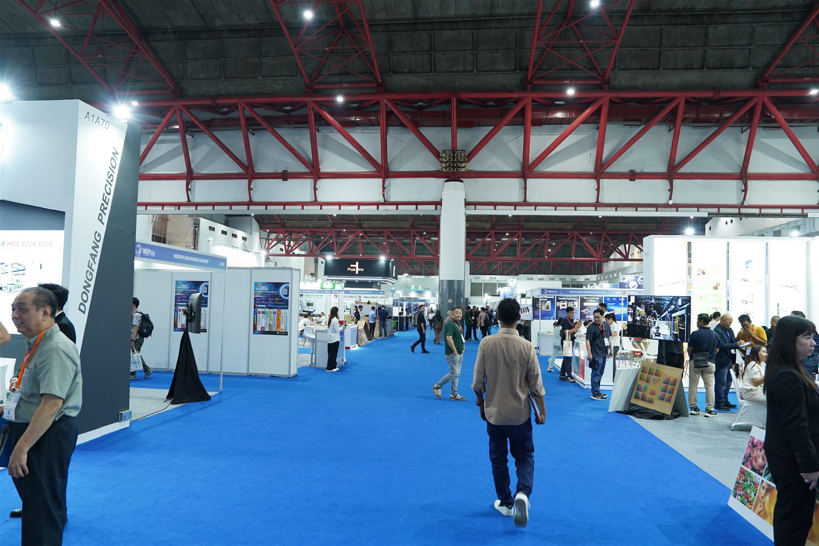 Paper packaging showcase with industry visitors